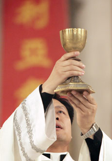 china_-_preist_celebrating